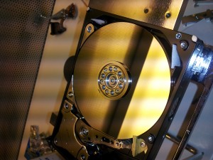 Picture of a hard drive platter in a clean room environment.